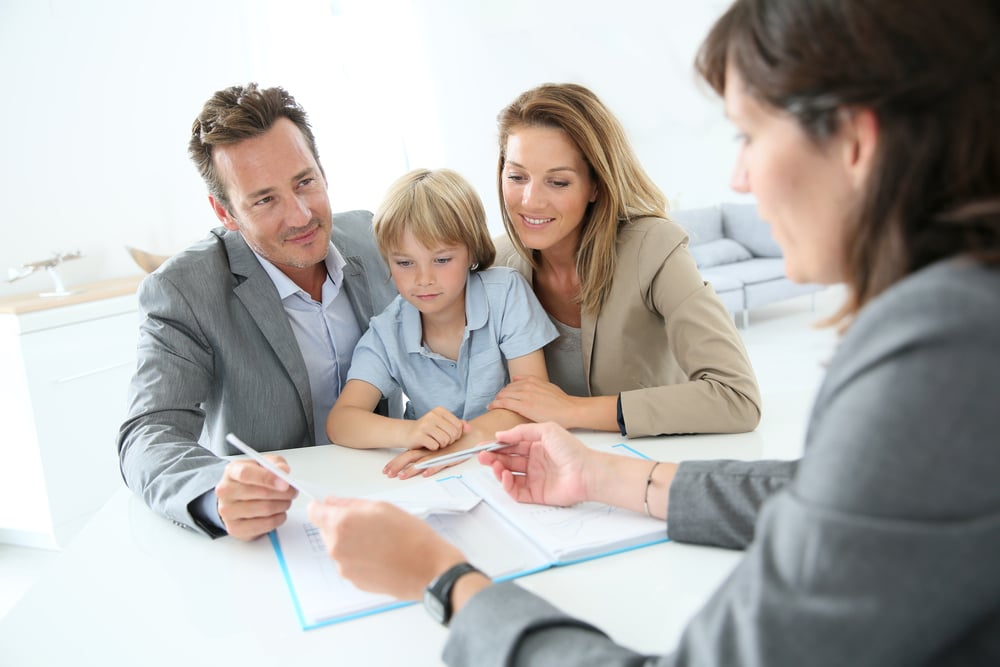 Family meeting real-estate agent to buy new home-1